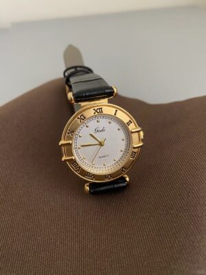 Vintage Gold Round White Face Black Leather Watch