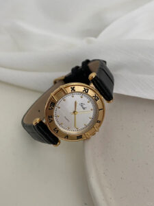 Vintage Gold Round White Face Black Leather Watch