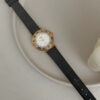 Vintage Gold Round White Face Black Leather Watch