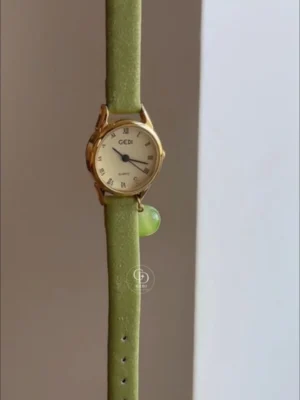 Dainty Green Leather Strap Ladies Watch Round Face Roman Numeral Watch for Women