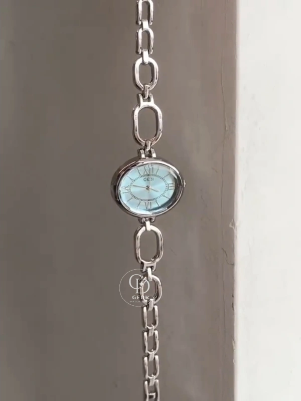 Minimalist Blue Roman Numeral Dial Watch for Women Oval Face Silver Bracelet Ladies Watch