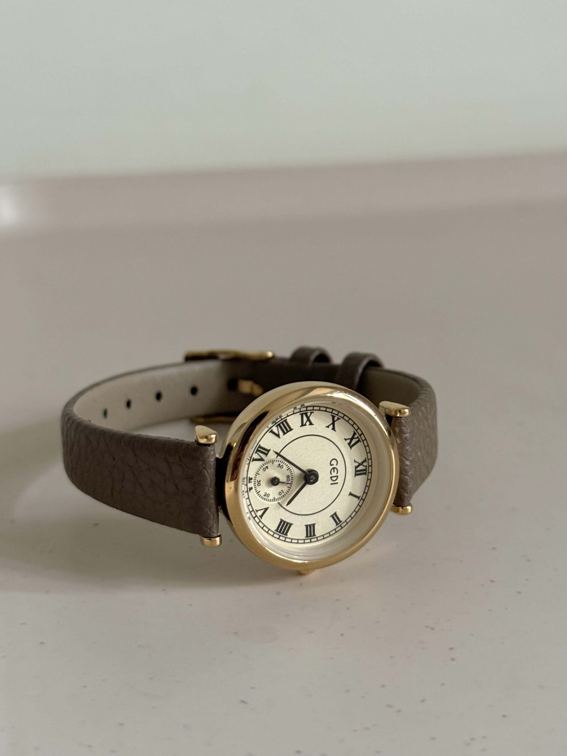 Gold Round Face Black/Grey/Orange Leather Watch