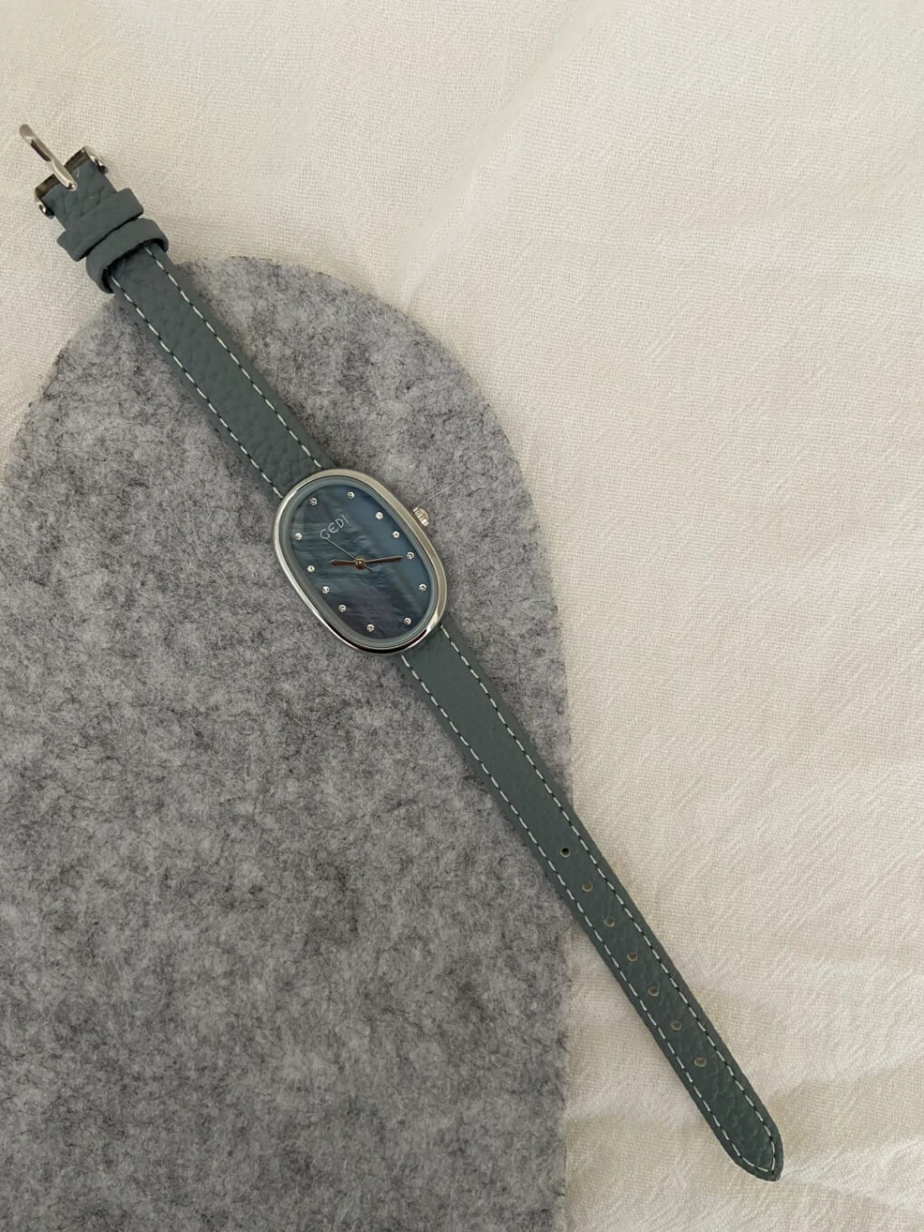 Blue Mother of Pearl Oval Face Leather Watch