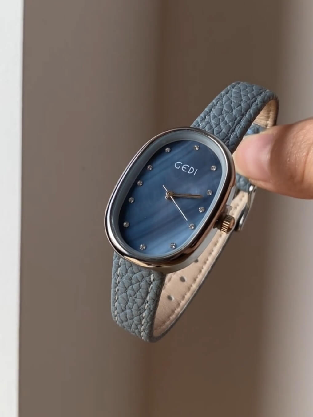 Blue Mother of Pearl Oval Face Leather Watch