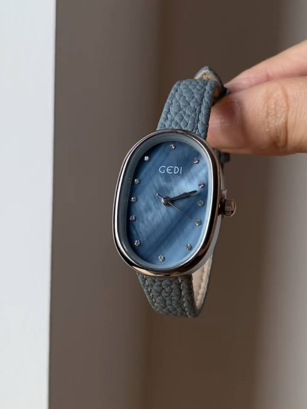 Blue Mother of Pearl Oval Face Leather Watch