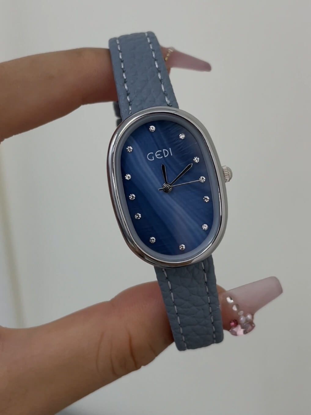 Blue Mother of Pearl Oval Face Leather Watch