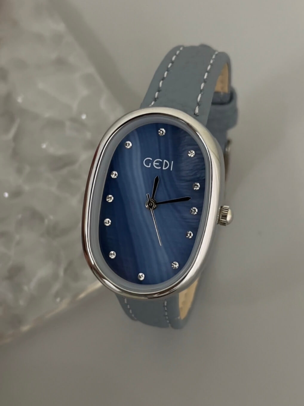 Blue Mother of Pearl Oval Face Leather Watch