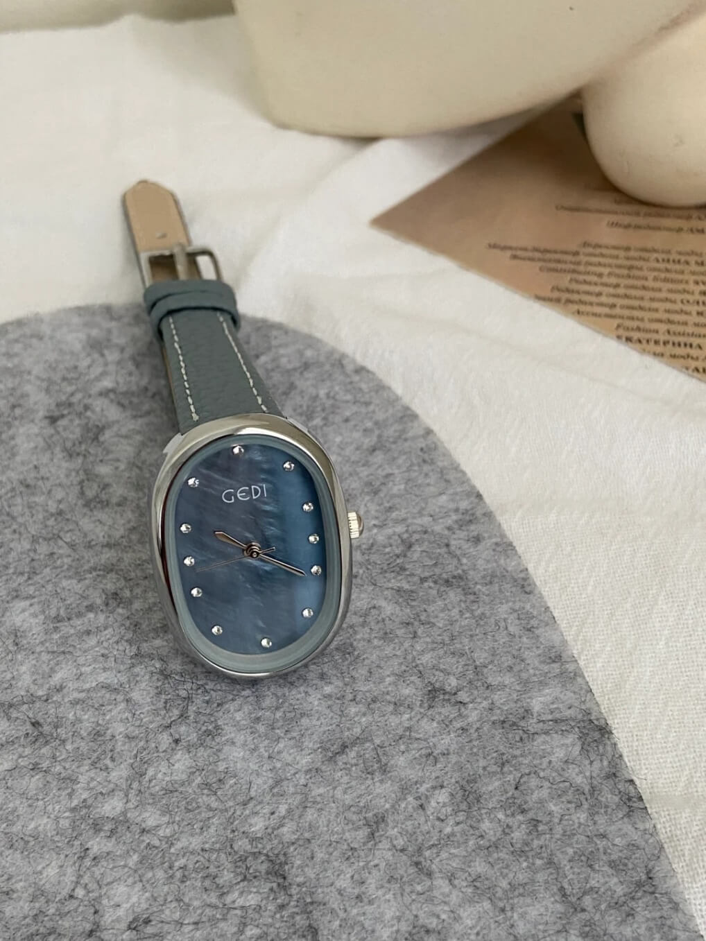 Blue Mother of Pearl Oval Face Leather Watch