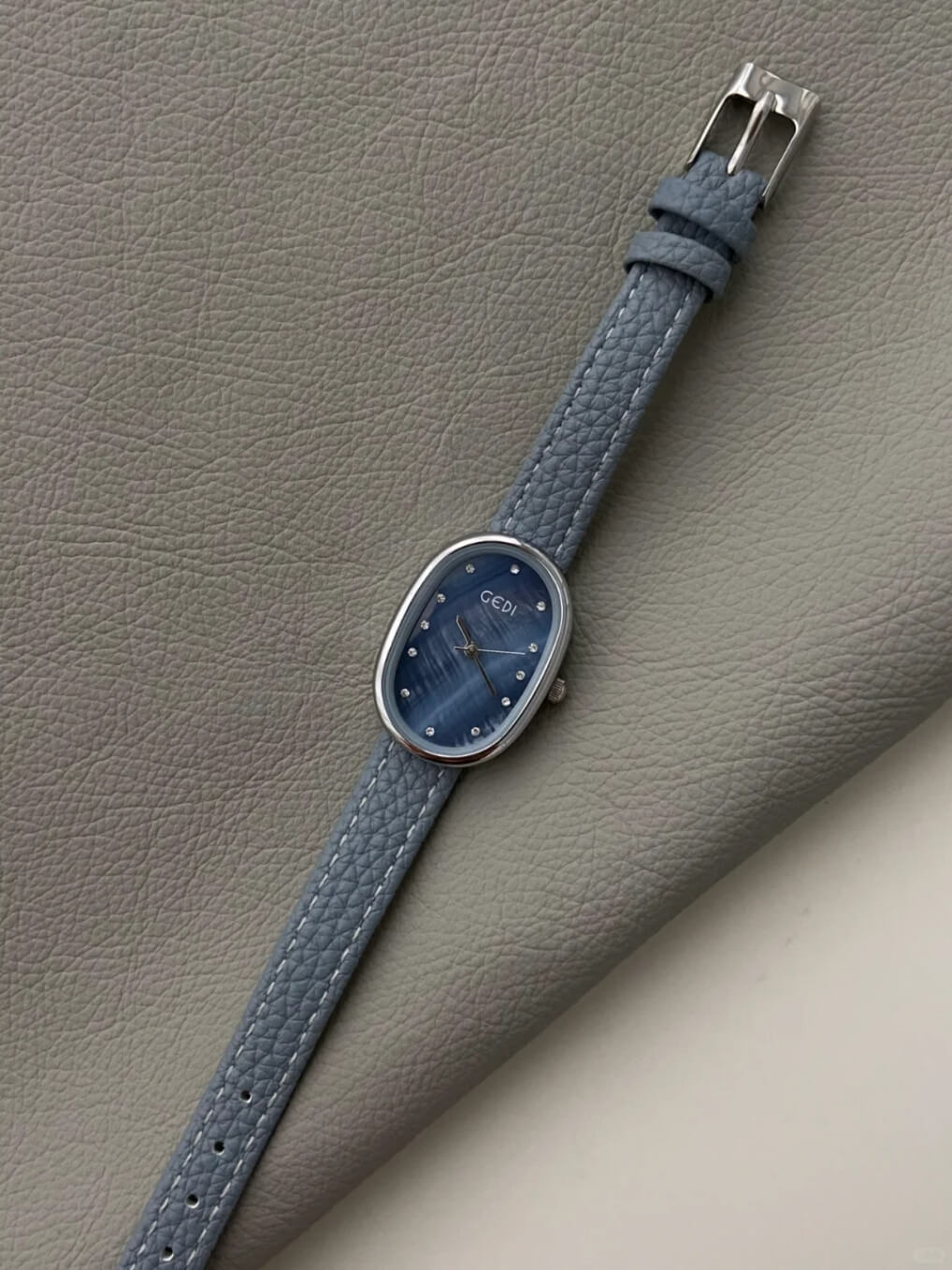 Blue Mother of Pearl Oval Face Leather Watch
