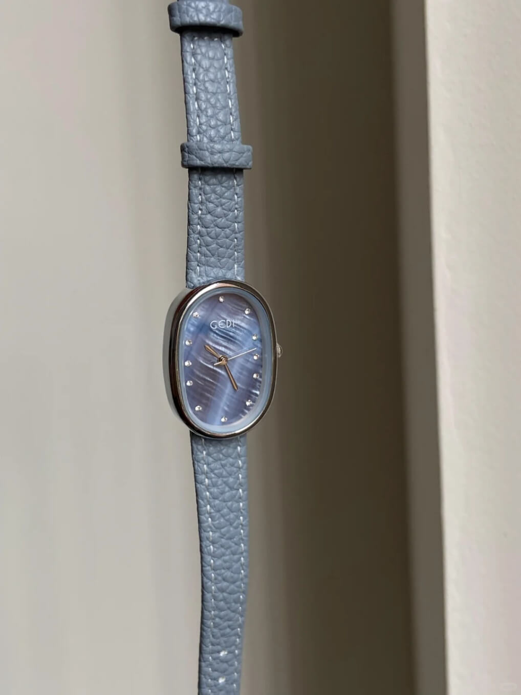 Blue Mother of Pearl Oval Face Leather Watch