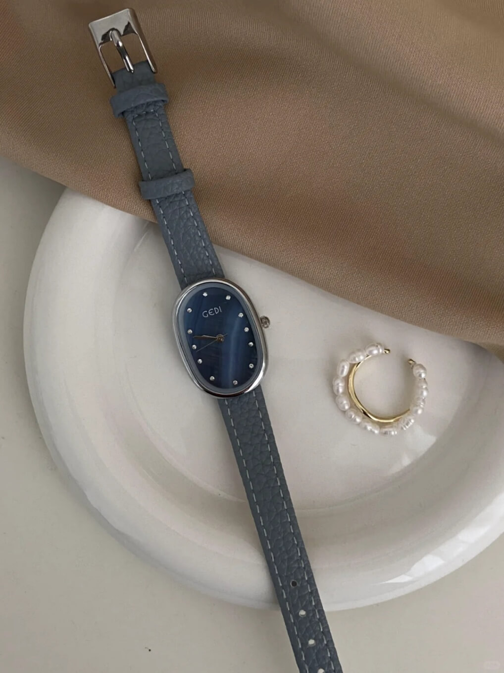 Blue Mother of Pearl Oval Face Leather Watch