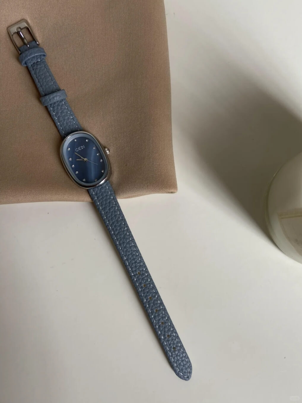 Blue Mother of Pearl Oval Face Leather Watch