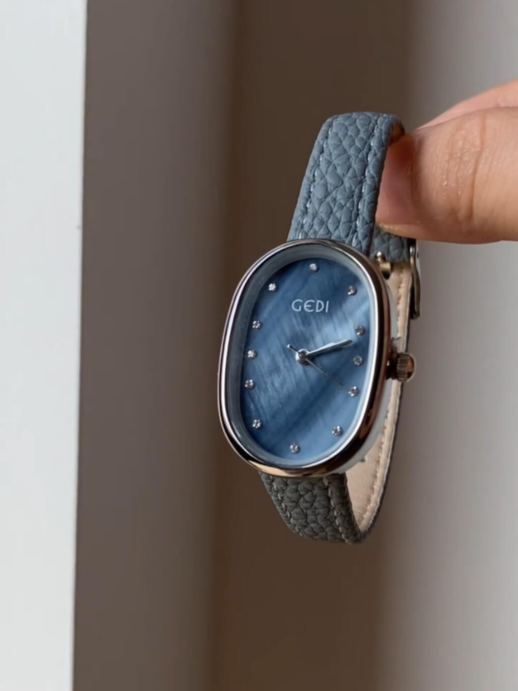 Blue Mother of Pearl Oval Face Leather Watch