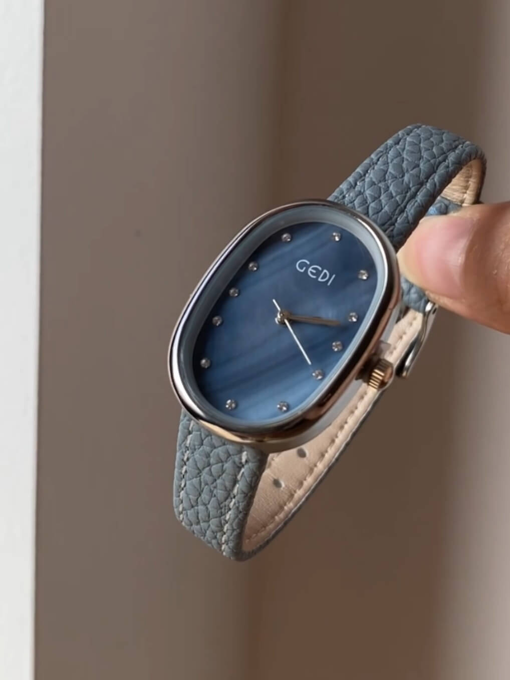 Blue Mother of Pearl Oval Face Leather Watch