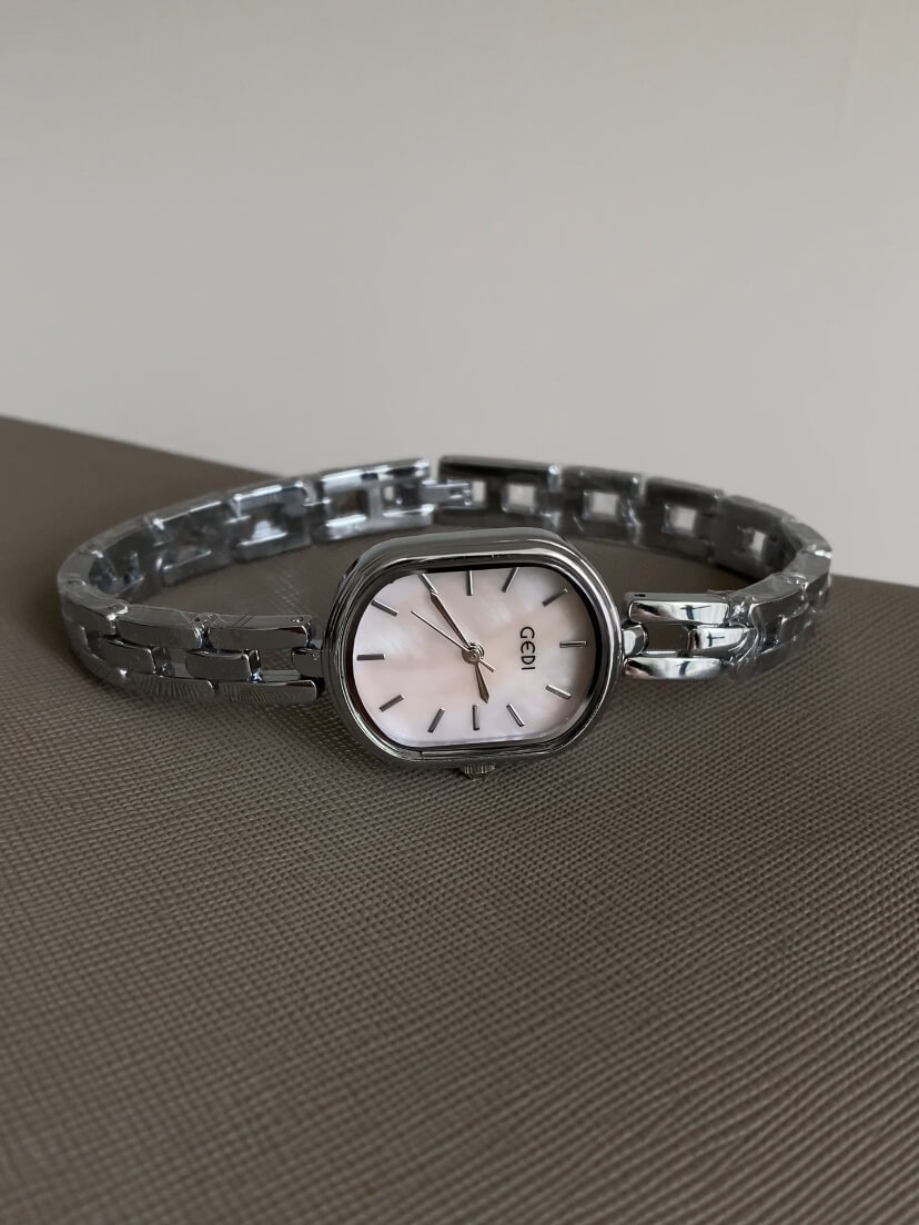 Dainty Mother of Pearl Oval Face Silver Bracelet Watch