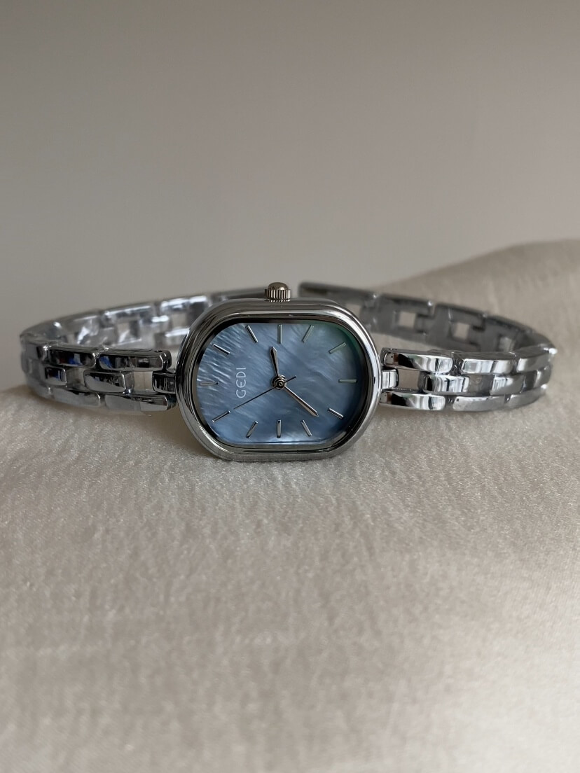 Dainty Mother of Pearl Oval Face Silver Bracelet Watch