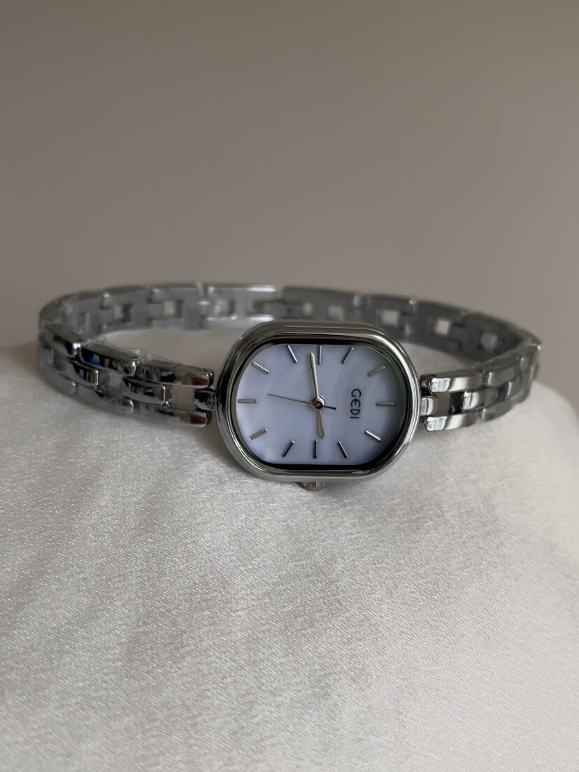 Dainty Mother of Pearl Oval Face Silver Bracelet Watch