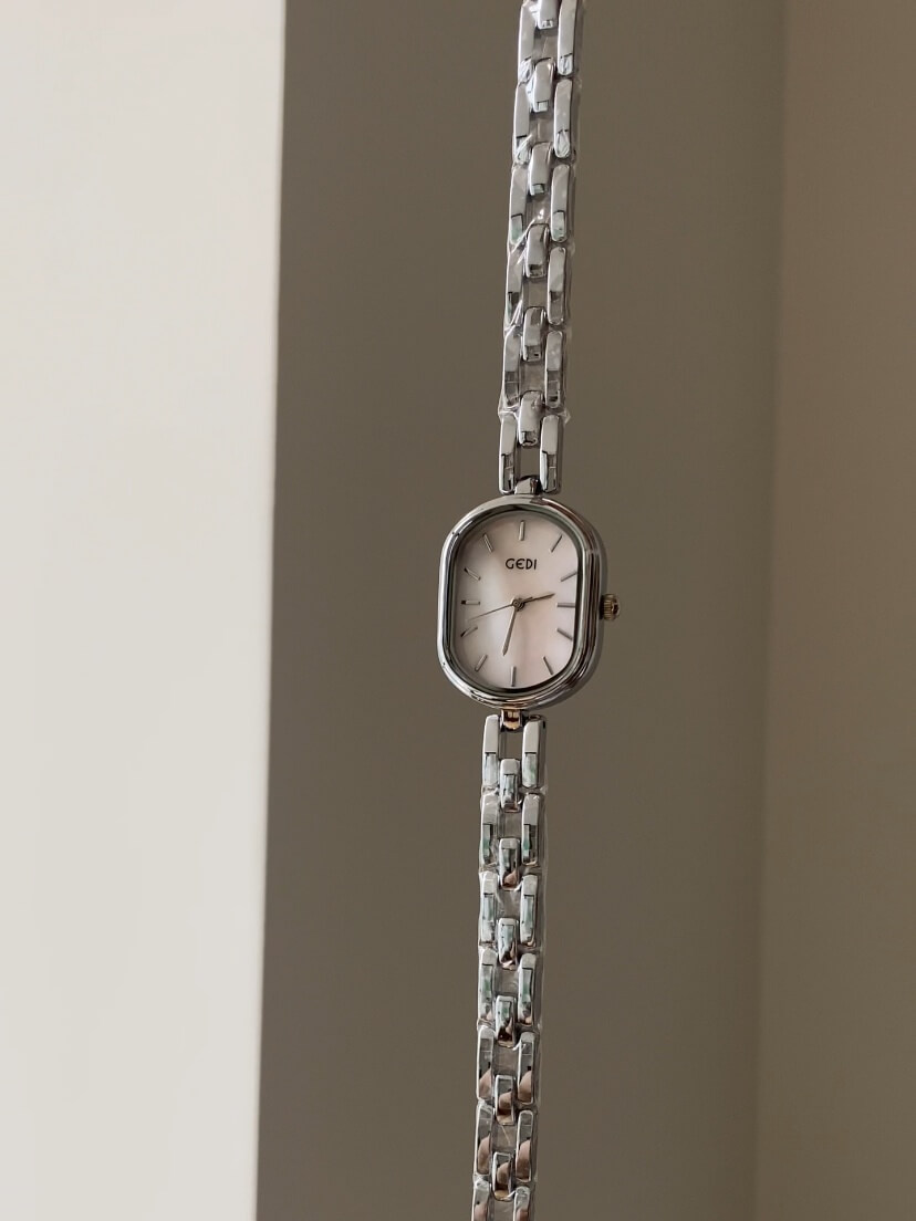 Dainty Mother of Pearl Oval Face Silver Bracelet Watch