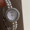 Dainty Round Face Pearl Chain Women’s Watch