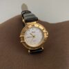 Vintage Gold Round White Face Black Leather Watch