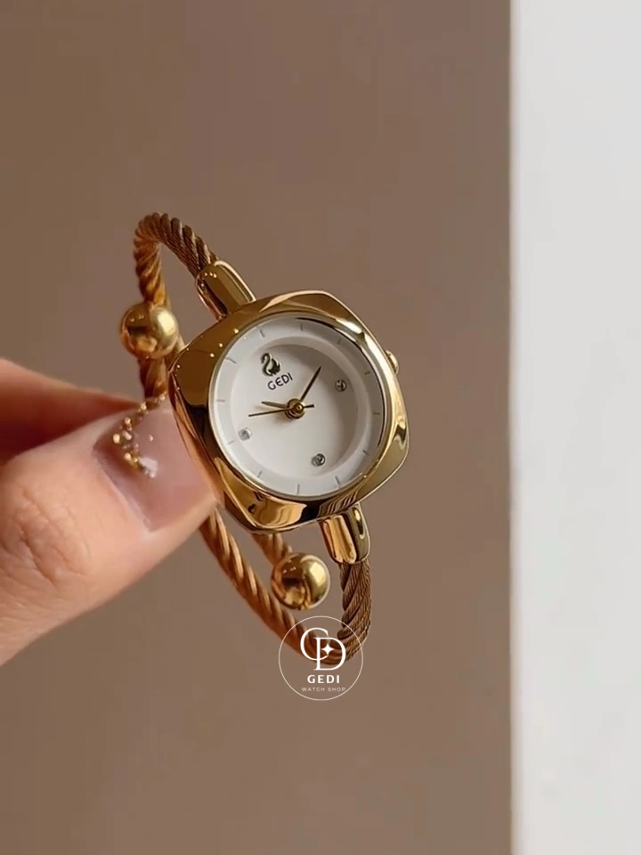 Elegant Bangle Watch with Black & Gold Strap Choices