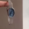 Elegant Oval Blue Dial Watch with Silver Mesh Band