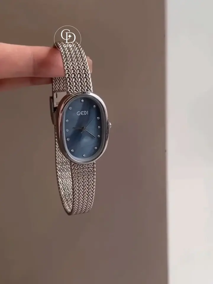 Elegant Oval Blue Dial Watch with Silver Mesh Band