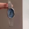 Elegant Oval Blue Dial Watch with Silver Mesh Band