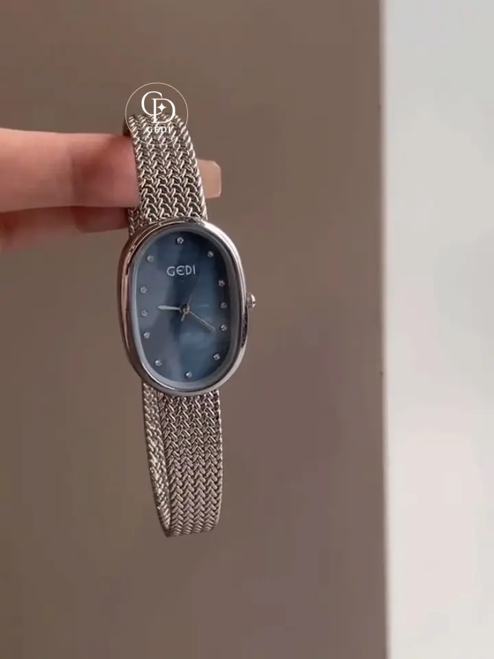 Elegant Oval Blue Dial Watch with Silver Mesh Band