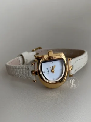 GEDI Gold-Tone Sculpted Case Women's Slim Strap Watch