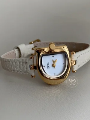 GEDI Gold-Tone Sculpted Case Women's Slim Strap Watch